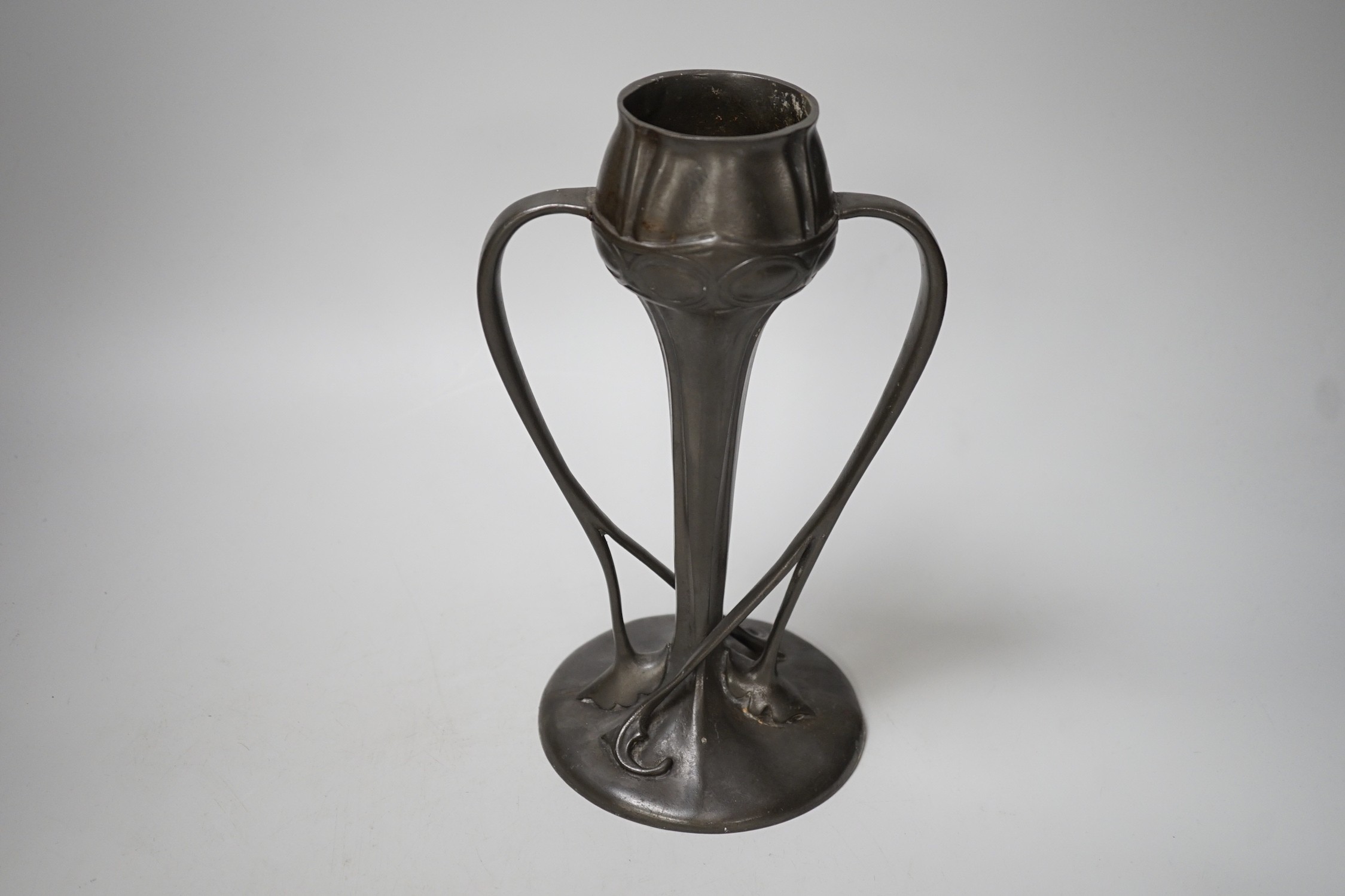 A Tudric pewter vase, model no. 029, 25cm tall